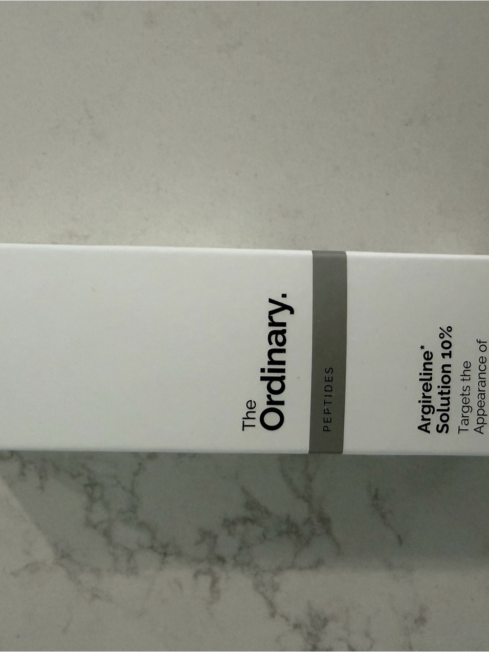 The Ordinary White and Gray Peptide Serum Box